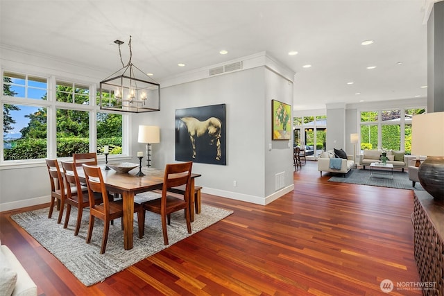 8418SE 44th St, Mercer Island, WA 98040 - dining room with baseboards, wood finished floors, a chandelier, recessed lighting, and ornamental molding