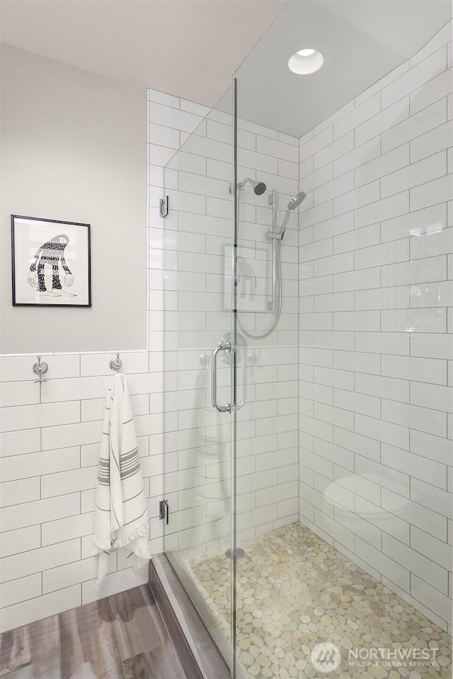 8418SE 44th St, Mercer Island, WA 98040 - full bath featuring a stall shower, tile walls, recessed lighting, and a wainscoted wall