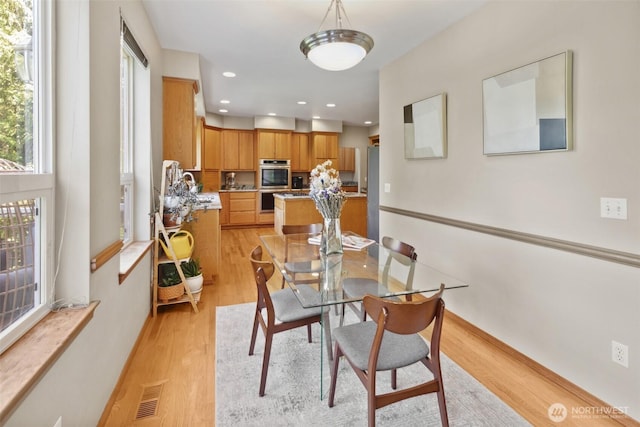 6117 Ames Lake Carnation Rd NE, Carnation, WA 98014 - dining area featuring light wood-type flooring and recessed lighting