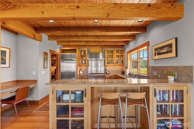 67 Goudy Grade Rd, Winthrop, WA 98862 - kitchen featuring built in fridge, a sink, wood ceiling with exposed beams, light wood-style floors, and decorative backsplash