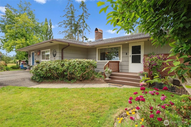236 Newaukum Valley Rd, Chehalis, WA 98532 - ranch-style home featuring a chimney and a front lawn