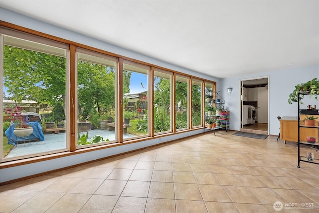 236 Newaukum Valley Rd, Chehalis, WA 98532 - unfurnished sunroom with plenty of natural light and washing machine and dryer