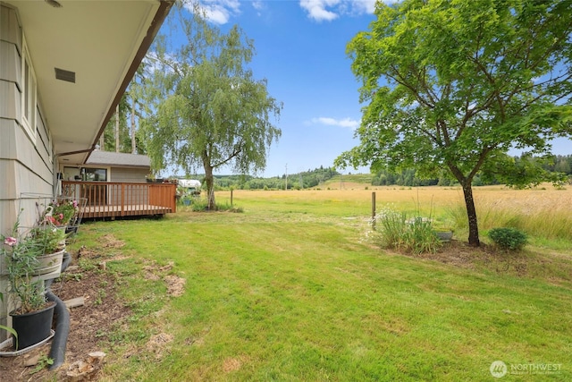 236 Newaukum Valley Rd, Chehalis, WA 98532 - view of grassy yard with a deck