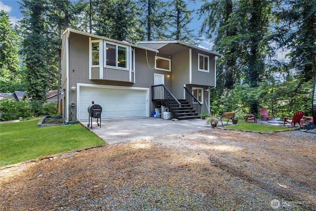 17642 Vine Ln SE, Yelm, WA 98597 - bi-level home featuring driveway, a garage, and a front lawn