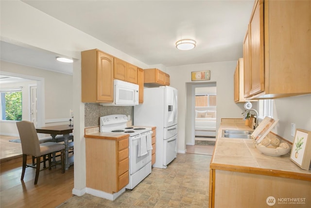 15222 37th Pl S, Tukwila, WA 98188 - kitchen with white appliances, decorative backsplash, light brown cabinets, and tile countertops