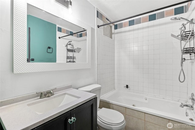 223 Carswell Dr, Moses Lake, WA 98837 - bathroom with toilet, tiled shower / bath combo, and vanity