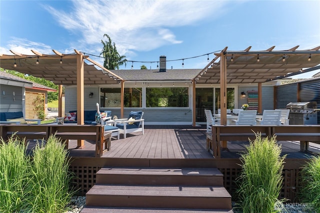 255 Lake Front Rd, Orondo, WA 98843 - wooden terrace featuring area for grilling, a pergola, and outdoor dining space