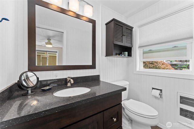 255 Lake Front Rd, Orondo, WA 98843 - bathroom featuring vanity, a ceiling fan, and heating unit