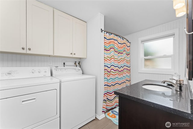 255 Lake Front Rd, Orondo, WA 98843 - laundry area featuring separate washer and dryer and light wood finished floors