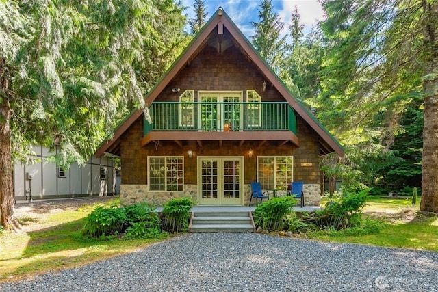 14030 Shuksan Rim Dr, Glacier, WA 98244 - back of property featuring french doors, a balcony, and stone siding