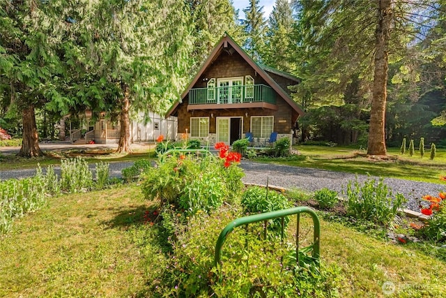14030 Shuksan Rim Dr, Glacier, WA 98244 - view of front of house with a balcony and a front yard