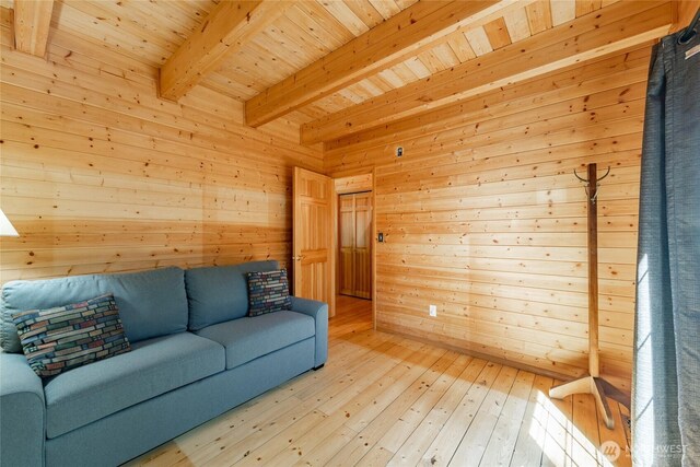 14030 Shuksan Rim Dr, Glacier, WA 98244 - living area with wood walls, light wood-style flooring, and a wooden ceiling with exposed beams
