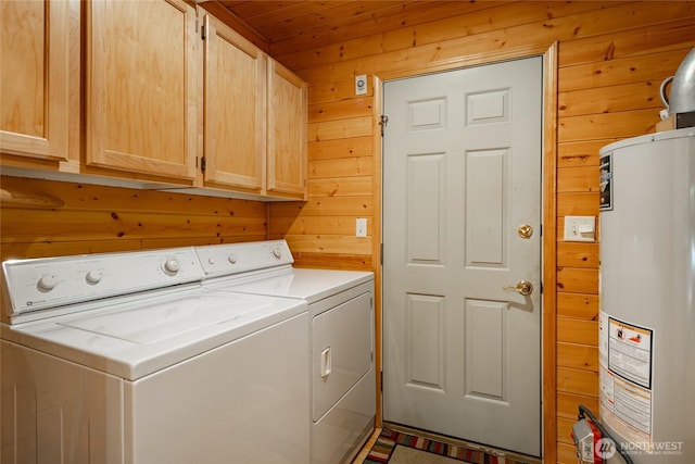 14030 Shuksan Rim Dr, Glacier, WA 98244 - laundry room with gas water heater, cabinet space, washing machine and dryer, wood walls, and wood ceiling