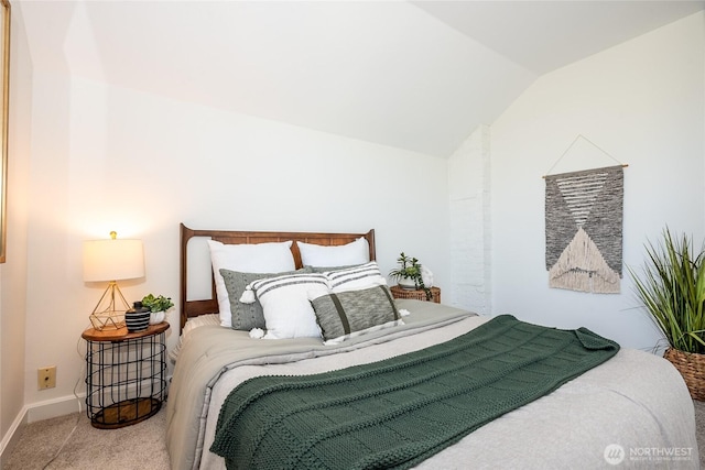 2029 S Charles St, Seattle, WA 98144 - carpeted bedroom featuring lofted ceiling and baseboards