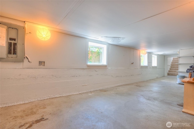 2029 S Charles St, Seattle, WA 98144 - basement featuring electric panel, stairway, and plenty of natural light