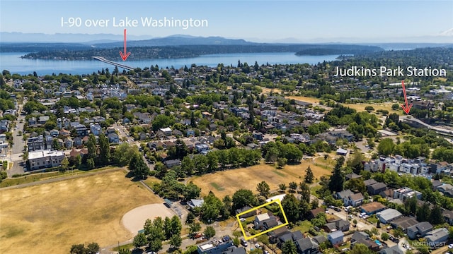 2029 S Charles St, Seattle, WA 98144 - aerial perspective of suburban area featuring property parcel outlined and a water and mountain view