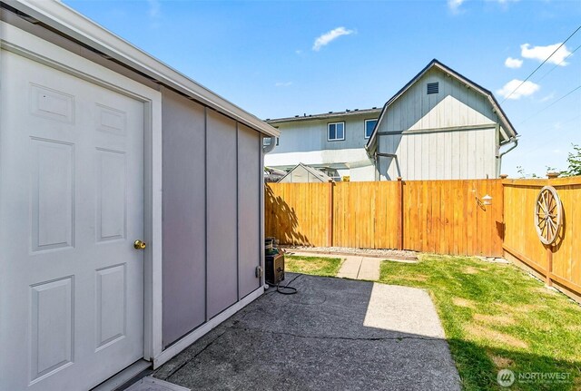8805 11th St NE, Lake Stevens, WA 98258 - fenced backyard with a patio area