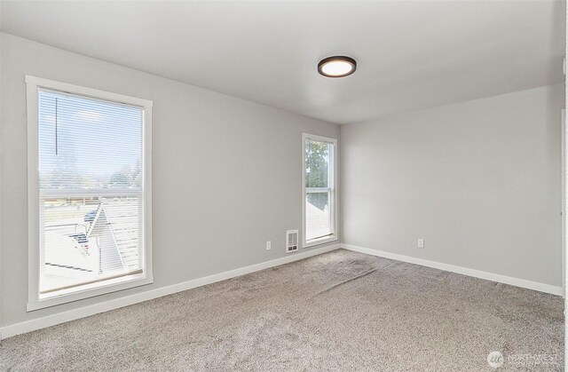8805 11th St NE, Lake Stevens, WA 98258 - carpeted spare room with baseboards