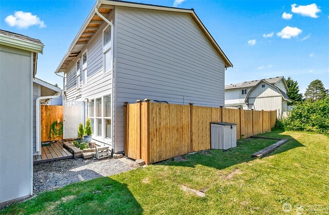 8805 11th St NE, Lake Stevens, WA 98258 - view of side of home with a deck