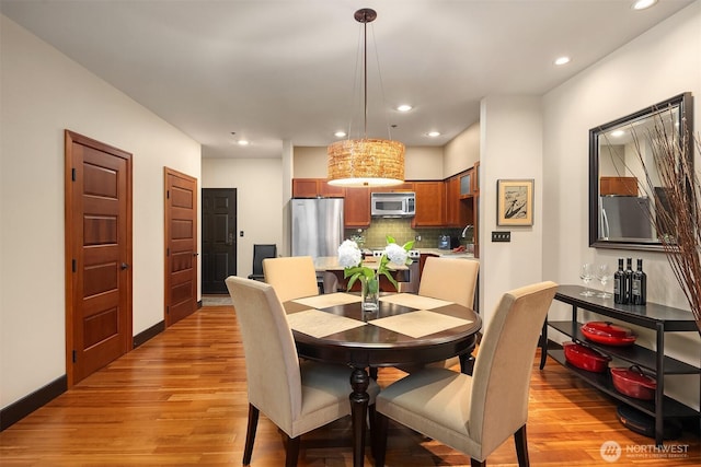 201 Galer St Unit 102, Seattle, WA 98109 - dining space with light wood finished floors and recessed lighting