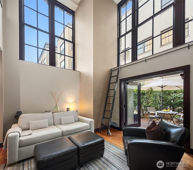 201 Galer St Unit 102, Seattle, WA 98109 - living room with a towering ceiling and wood finished floors