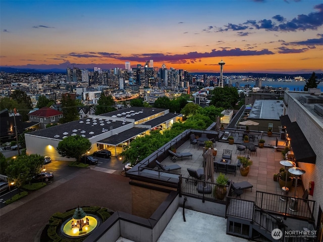 201 Galer St Unit 102, Seattle, WA 98109 - aerial view at dusk of a view of city
