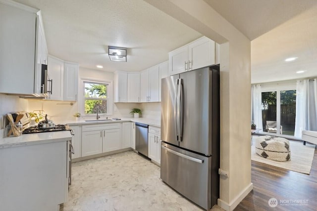 6410 Cypress St, Everett, WA 98203 - kitchen with stainless steel appliances, healthy amount of natural light, light countertops, and recessed lighting