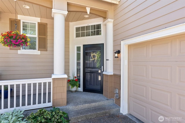 4109 Ingleside Loop SE, Lacey, WA 98503 - view of exterior entry featuring a porch and a garage