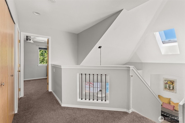 4109 Ingleside Loop SE, Lacey, WA 98503 - corridor featuring a skylight, carpet, and an upstairs landing