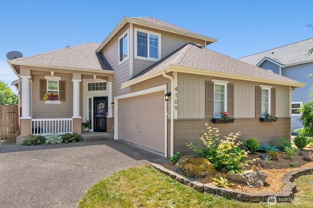 4109 Ingleside Loop SE, Lacey, WA 98503 - view of front of house featuring a shingled roof, a porch, asphalt driveway, and a garage