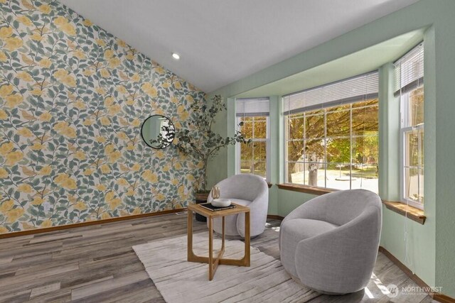 2004 15th Ave SW, Olympia, WA 98502 - sitting room featuring wallpapered walls, vaulted ceiling, wood finished floors, and recessed lighting