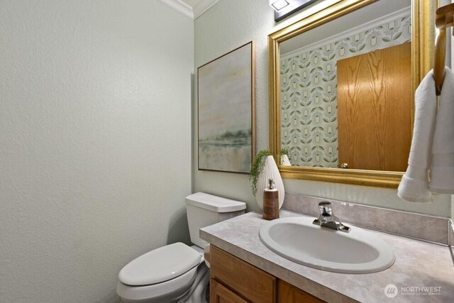 2004 15th Ave SW, Olympia, WA 98502 - bathroom featuring crown molding, vanity, and a textured wall