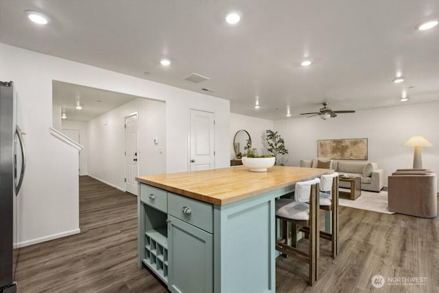 1709 Fern St SW, Olympia, WA 98502 - kitchen featuring wooden counters, freestanding refrigerator, dark wood-type flooring, a ceiling fan, and recessed lighting