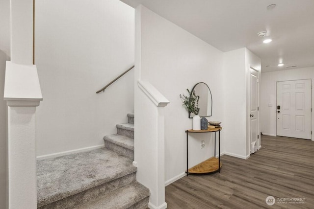 1709 Fern St SW, Olympia, WA 98502 - staircase featuring wood finished floors and recessed lighting