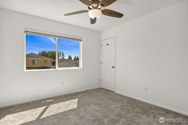 1709 Fern St SW, Olympia, WA 98502 - carpeted empty room with a ceiling fan and baseboards