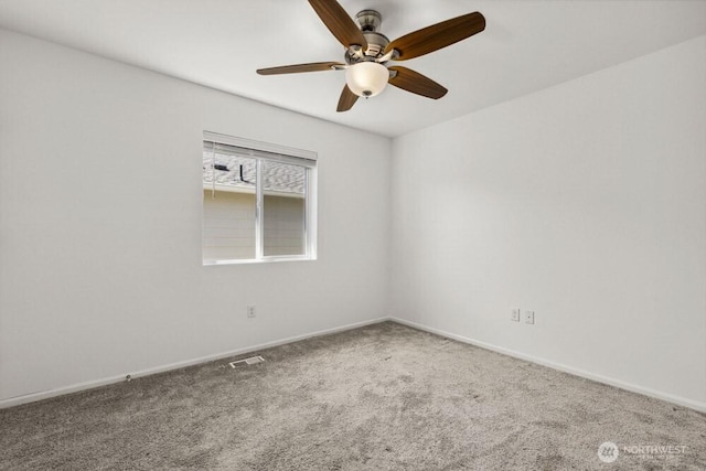 1709 Fern St SW, Olympia, WA 98502 - carpeted spare room featuring a ceiling fan and baseboards