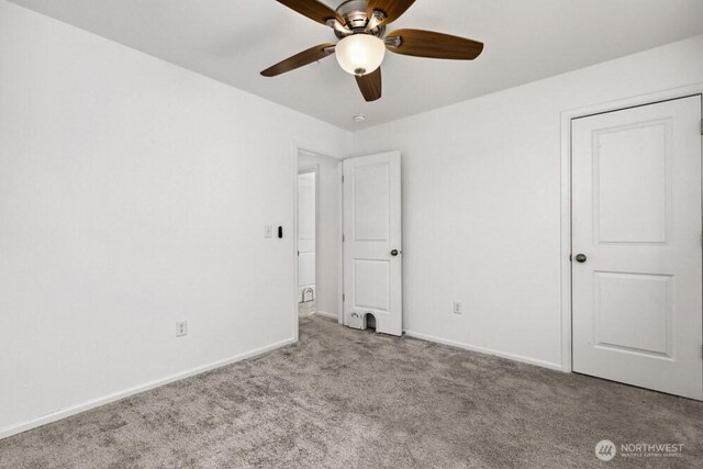 1709 Fern St SW, Olympia, WA 98502 - unfurnished bedroom featuring carpet flooring and ceiling fan