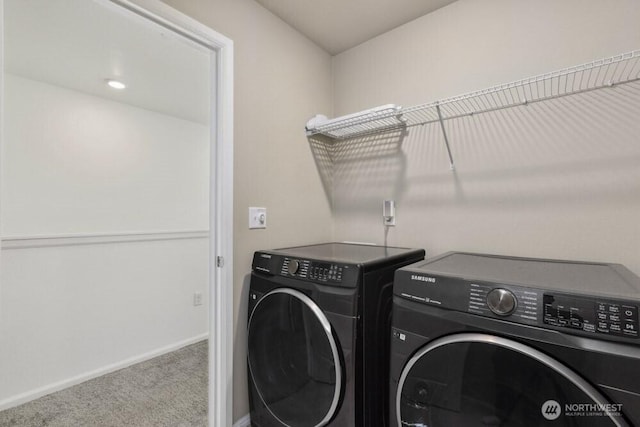 1709 Fern St SW, Olympia, WA 98502 - laundry area with washing machine and clothes dryer and carpet flooring