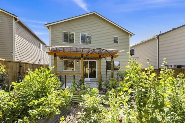 1709 Fern St SW, Olympia, WA 98502 - rear view of house with a pergola