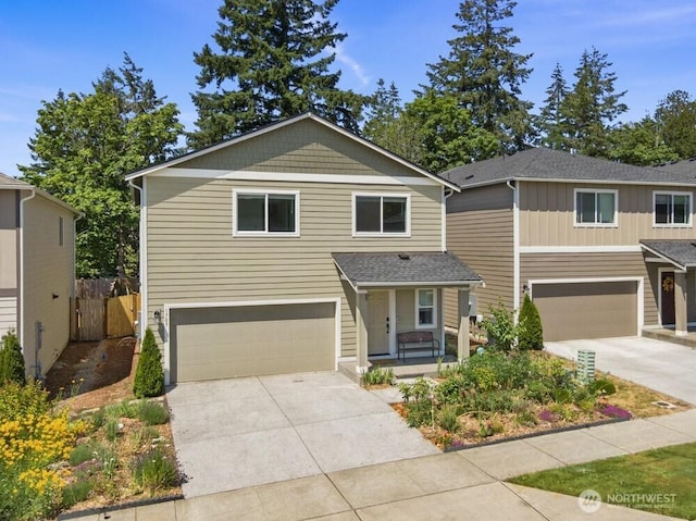 1709 Fern St SW, Olympia, WA 98502 - traditional-style house featuring an attached garage, concrete driveway, and a porch