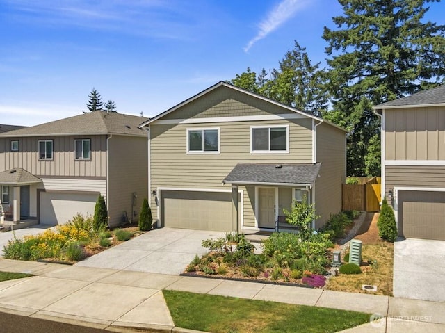 1709 Fern St SW, Olympia, WA 98502 - traditional home featuring driveway, a garage, and roof with shingles