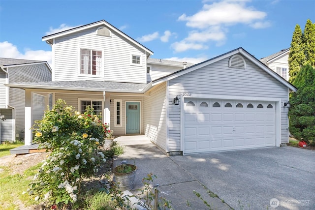 20602 86th Avenue Ct E, Spanaway, WA 98387 - traditional-style house with concrete driveway and a garage