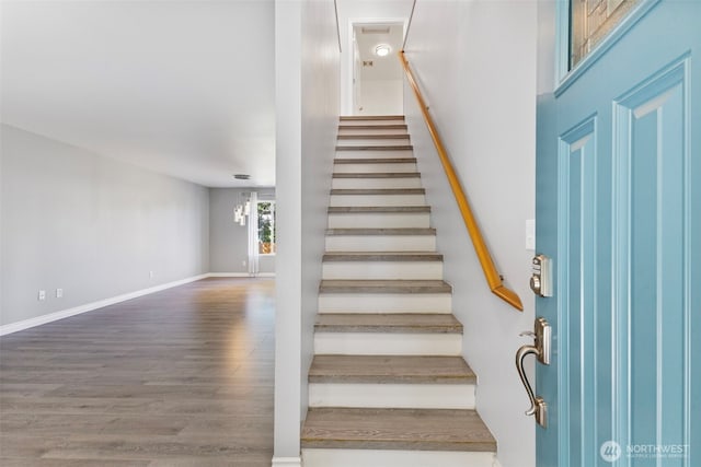 20602 86th Avenue Ct E, Spanaway, WA 98387 - stairway featuring wood finished floors and baseboards