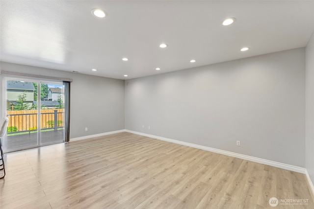 20602 86th Avenue Ct E, Spanaway, WA 98387 - empty room with light wood-style flooring, baseboards, and recessed lighting