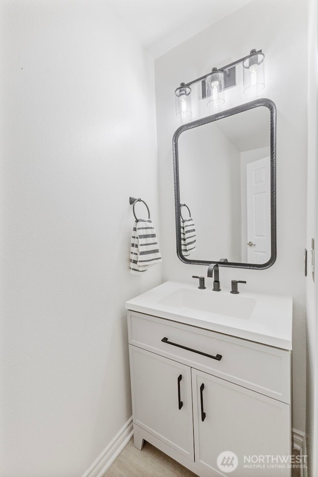 20602 86th Avenue Ct E, Spanaway, WA 98387 - bathroom with vanity and baseboards