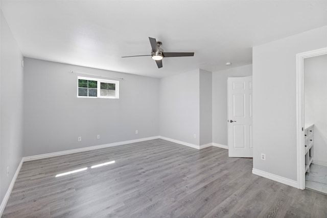 20602 86th Avenue Ct E, Spanaway, WA 98387 - empty room with ceiling fan, wood finished floors, and baseboards