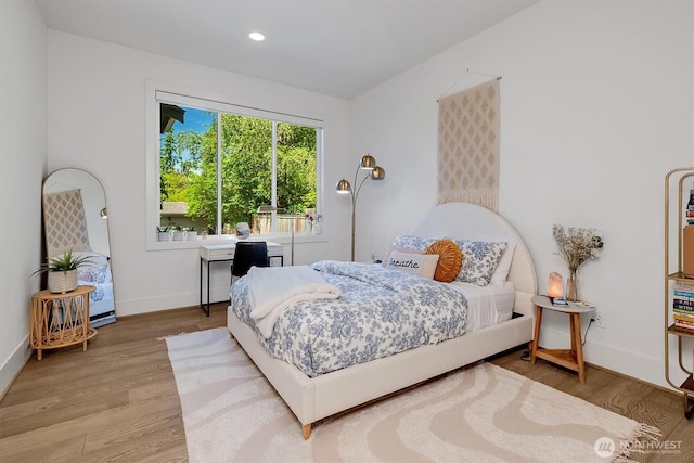 14430 SE 18th St, Bellevue, WA 98007 - bedroom with wood finished floors, baseboards, and recessed lighting