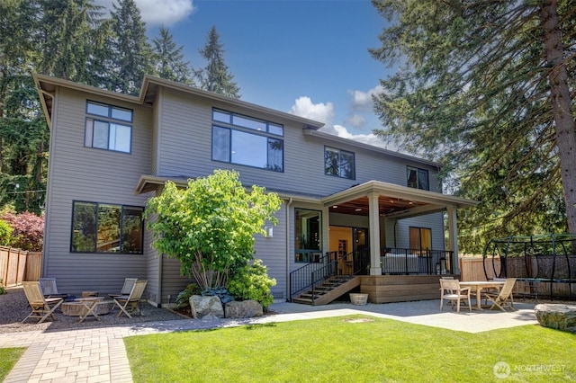 14430 SE 18th St, Bellevue, WA 98007 - back of property with a fire pit and a patio