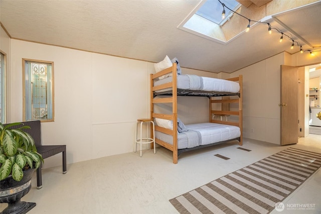 316 W Lake Samish Dr Unit 10, Bellingham, WA 98229 - bedroom featuring a skylight and rail lighting