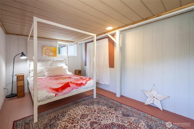 316 W Lake Samish Dr Unit 10, Bellingham, WA 98229 - bedroom featuring wood walls
